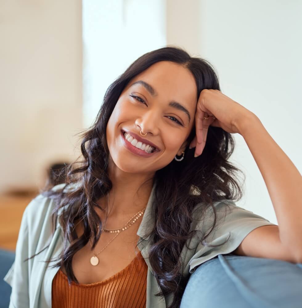 smiling-mixed-race-woman-looking-at-camera-2023-11-27-05-12-21-utc (1)